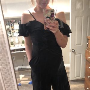 Black jumpsuit- size large. Fits to size.